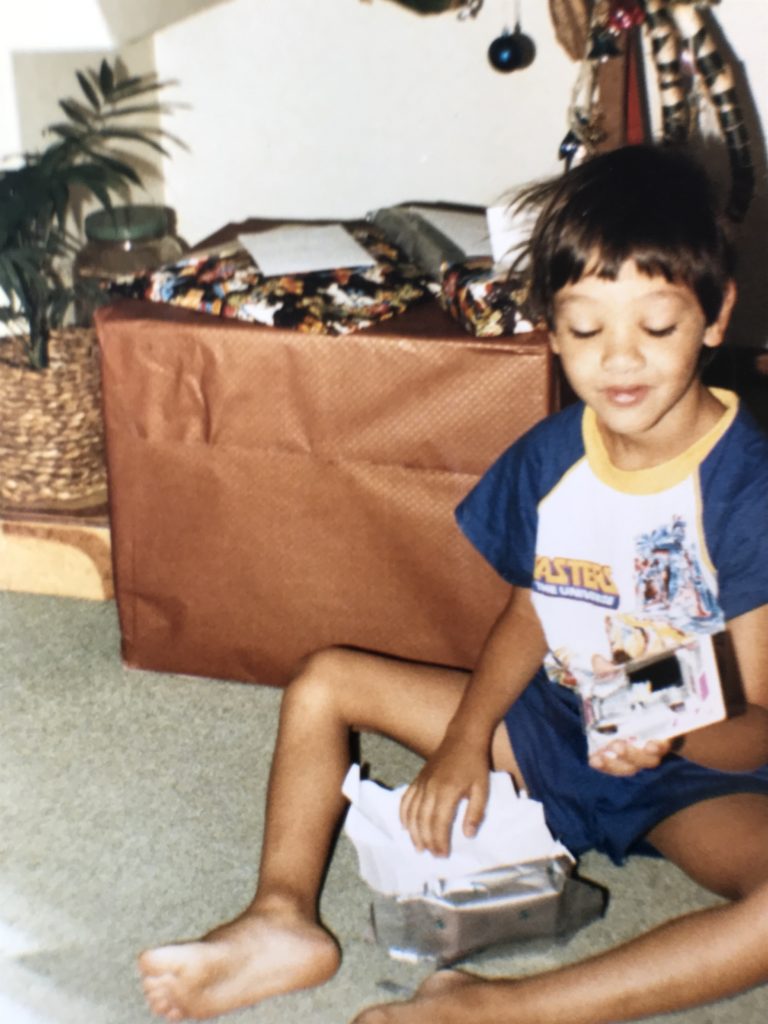 Robert opening his gifts. Christmas 1984