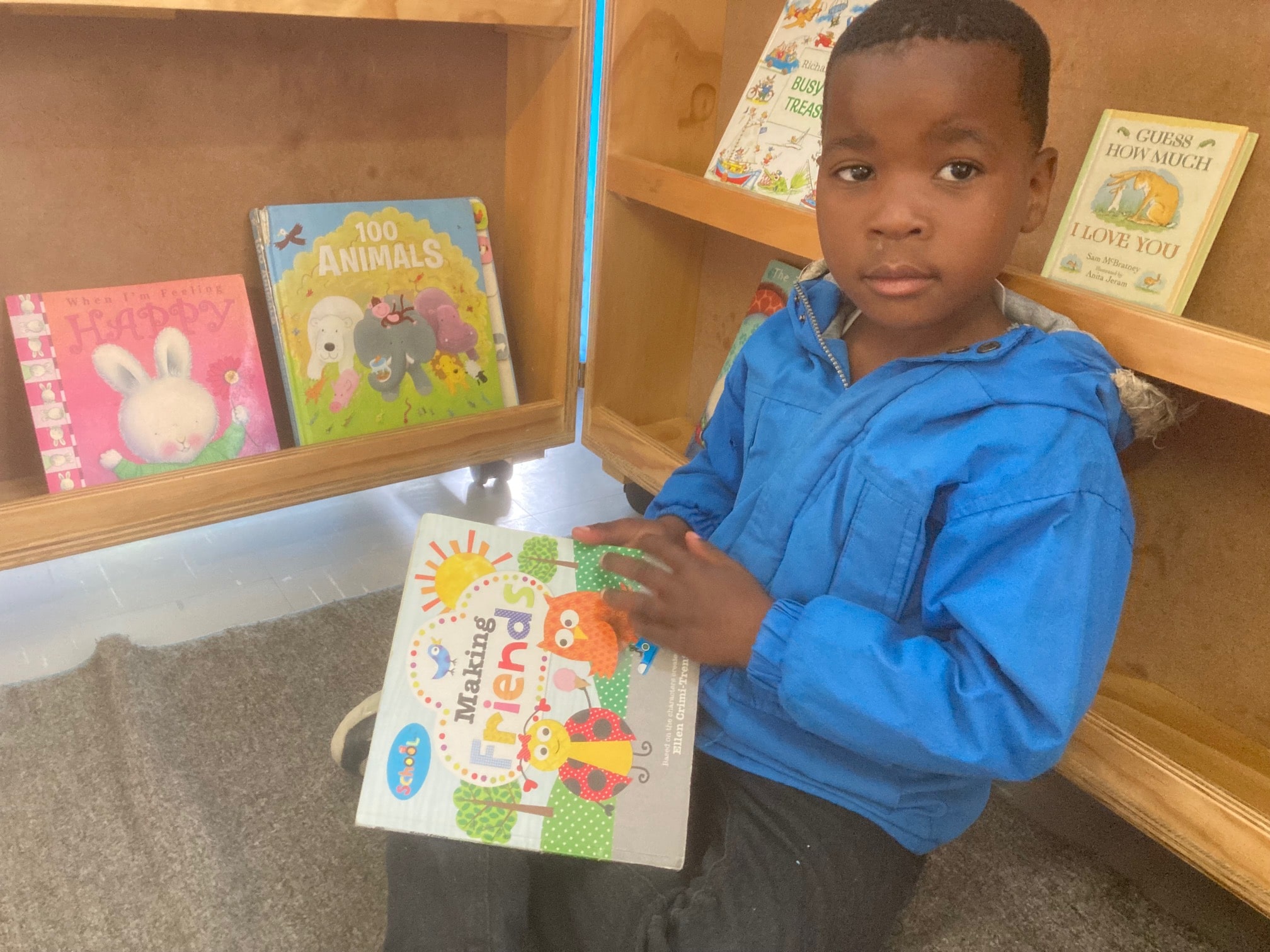 Enkosi reading a book