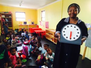 Ntsiki's daughter Khanya standing in the classroom