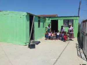 Ntsiki and the preschool children in front of her eldest daughter’s house.