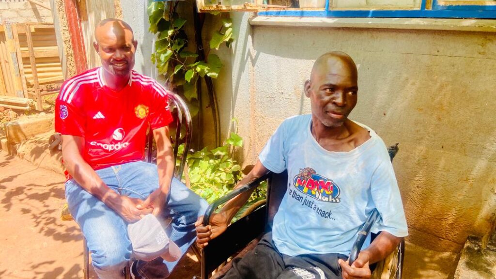 Jacob, Loice's grandfather in the wheelchair (on the right)